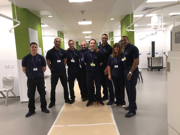 The specialist team from Environmental Excellence Training & Development Ltd, which carried out the vital clinical clean on the NHS Louisa Jordan Nightingale hospital, on completion before it opened  